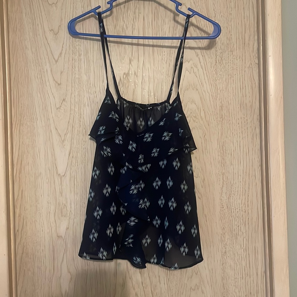 Navy blue see through top. With lighter blue designs. Size: Large.